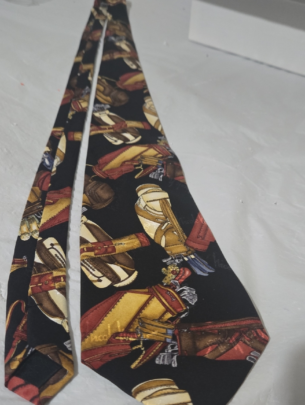 Nicole Miller 1994 100% Silk Black Tie with Gold, Brown and Red GOLF Print